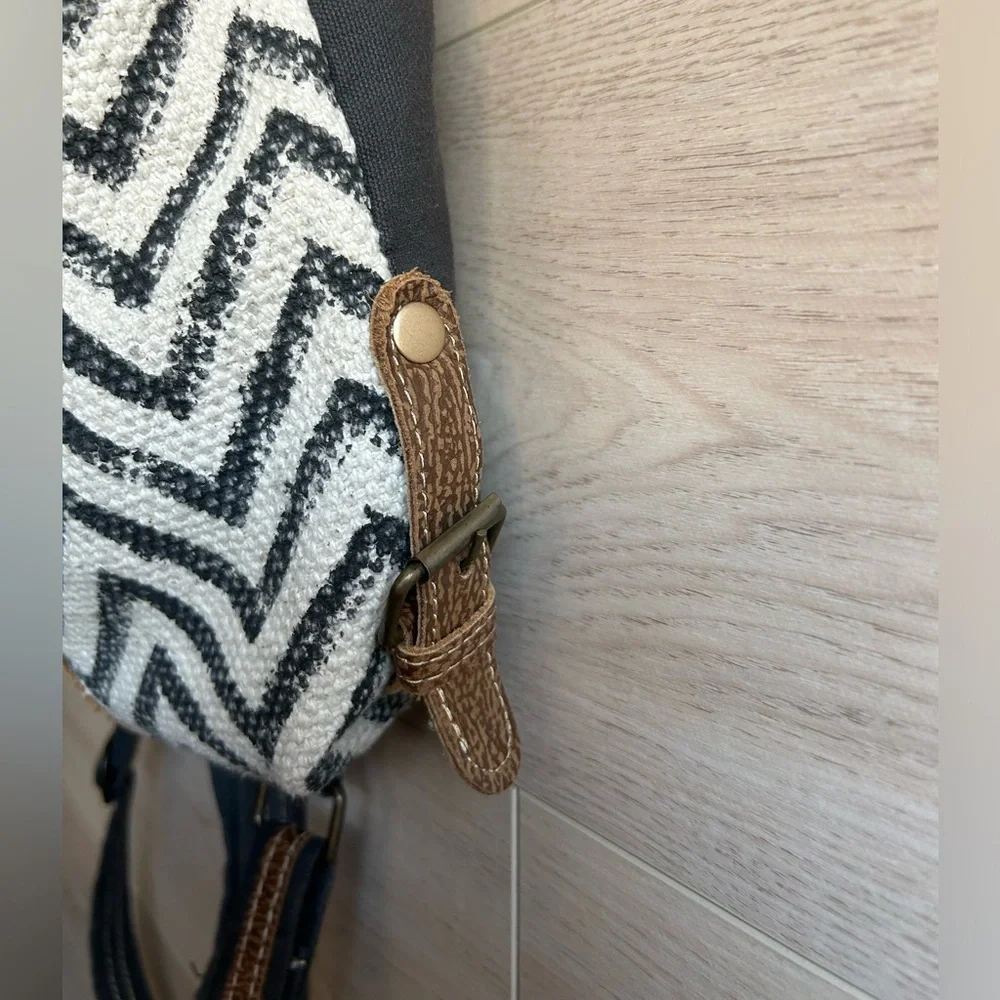 Myra Chevron Brown and White Patterned Backpack with Cowhide Flap.